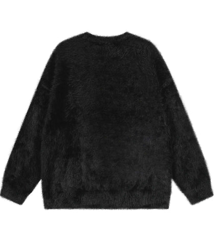 Back view of Regular Fit Animal Print Fleece Sweater showcasing soft fleece fabric in a cozy silhouette.