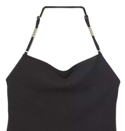 Stylish black halter top with unique shoulder strap details, perfect for summer outfits.
