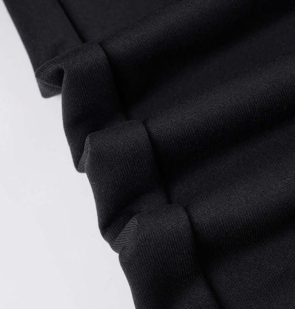 Detail view of the fabric of Black Sport Casual Pants – Loose Fit, showcasing the quality and texture in solid black.