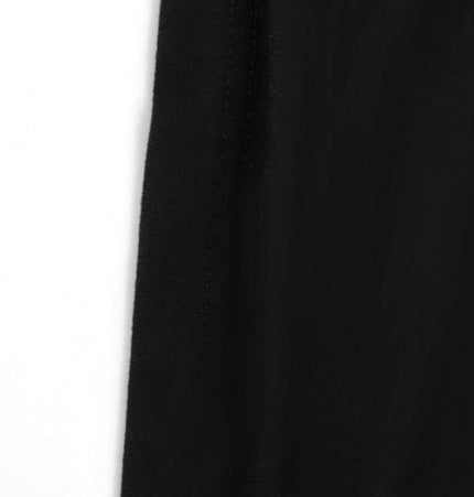 Close-up of the fabric of the Strapless Sports Bralette Tank Top – Slim Fit showcasing its sleek black texture.