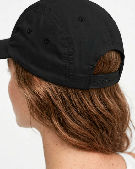 Close-up of the mesh lining and crown on the nylon five-panel cap
