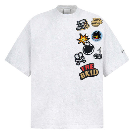 Cartoon Badge Cotton TShirt – Loose Fit featuring playful patches and a trendy oversized design.