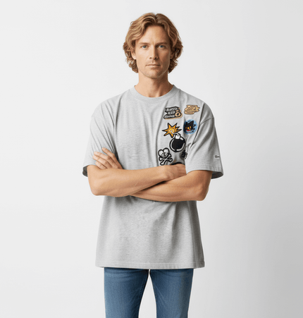 Cartoon Badge Cotton TShirt – Loose Fit displayed on a model featuring playful badges and a relaxed oversized style.