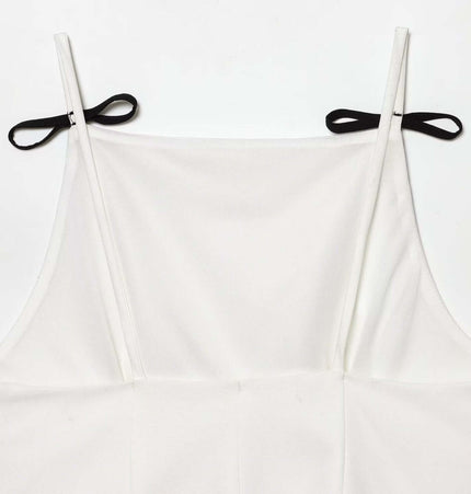 Casual Bow Detail Strap Top – Slim Fit featuring black bow detail and slim fit silhouette in solid white color.