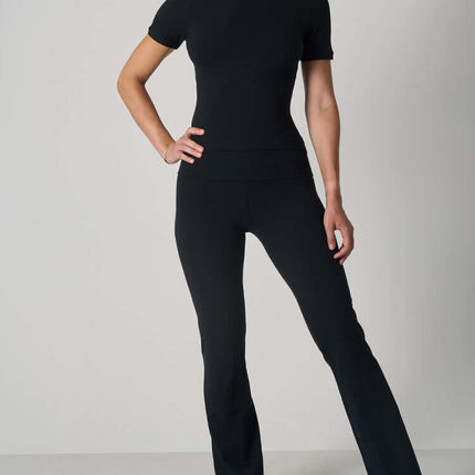 Casual Fit Cotton Jersey Yoga Set featuring a short sleeve crop top and high-waist long flare pants in black.