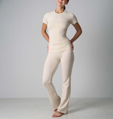Casual Fit Cotton Jersey Yoga Set in beige, featuring a crop top and high-waist flare pants, ideal for yoga and lounging.
