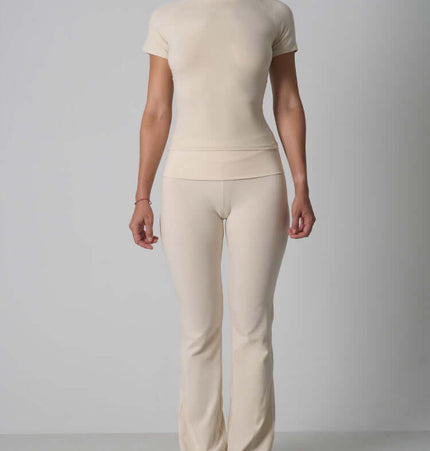 Casual Fit Cotton Jersey Yoga Set featuring a short sleeve crop top and high-waist long flare pants for stylish comfort.