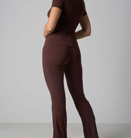 Casual Fit Cotton Jersey Yoga Set shown in brown, featuring a short sleeve crop top and high-waist long flare pants.