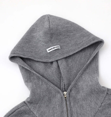Casual Solid Color Tracksuit Set showing a close-up of the gray hoodie with a zipper and brand label.