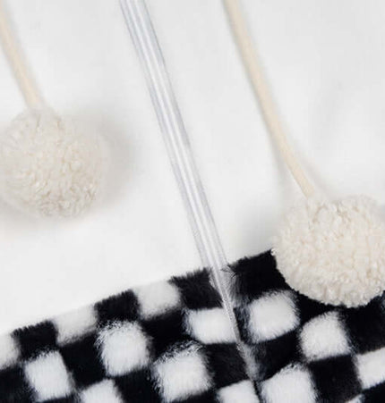Checkered Fleece Hoodie with Rabbit Ears showing rabbit ear details and pom-pom accents on a cozy fleece fabric.
