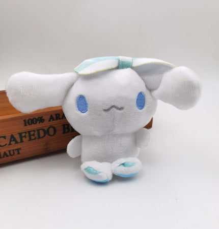 Cinnamoroll Plush Keychain – 10cm, cute plush doll with blue accents and a decorative bead chain.