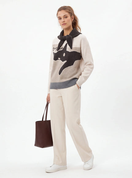 Close-up of Blue cute cat shawl knit top fabric