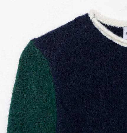 Color Block Patchwork Knit Sweater featuring a round neckline and colorful patchwork design.