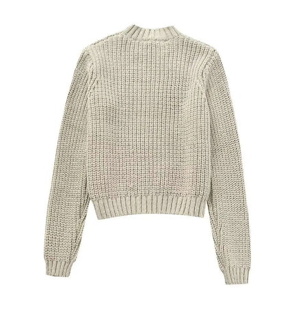 Back view of the Contrast Cropped Knit Sweater – Slim Fit in a light color, featuring a ribbed texture and long sleeves.