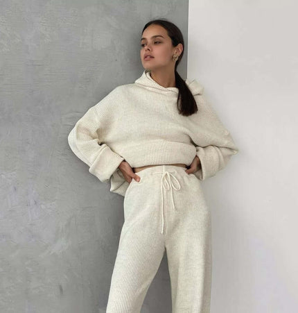 Cotton Blend Two-Piece Sports Set model wearing cozy hoodie and matching bottoms against a minimalist background.