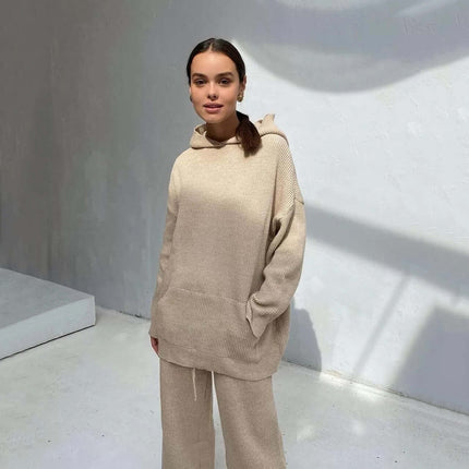 Cotton Blend Two-Piece Sports Set model wearing a cozy beige hoodie and matching bottoms in a bright setting.