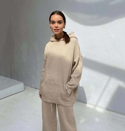 Cotton Blend Two-Piece Sports Set model wearing a cozy beige hoodie and matching bottoms in a bright setting.