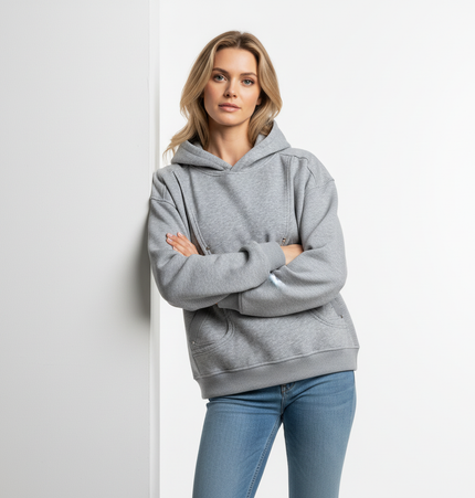 Cotton Loose Fit Hoodie Sweatshirt modeled by a woman, styled with a casual outfit, standing against a white wall.