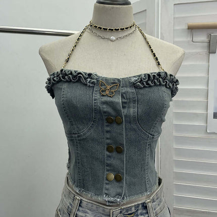 Denim Buckle Strapless Slim Fit Tank Top featuring butterfly detailing and ruffled edges on a dress form.