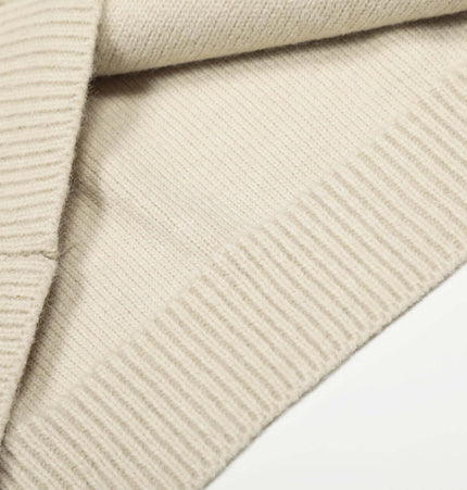 Knit Zipper Sweater Jacket – High Neck close-up of soft acrylic blend fabric showing ribbed detail.