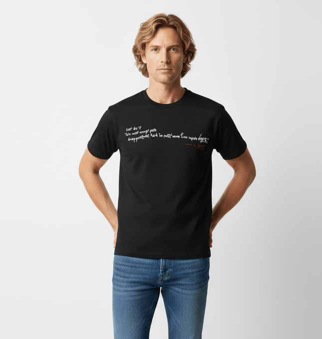 Creative Letter Print Loose Fit TShirt worn by a man with a relaxed stance, showcasing its trendy design and comfort.