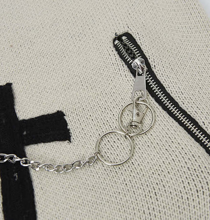 Cross Jacquard Knit Sweater – Loose Fit close-up showing zip detail and cross design.