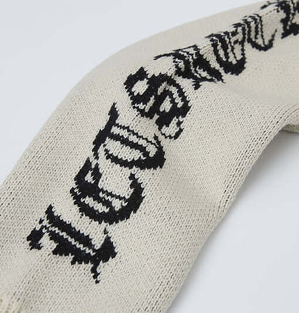 Cross Jacquard Knit Sweater – Loose Fit featuring a stylish knit design and soft fabric texture.