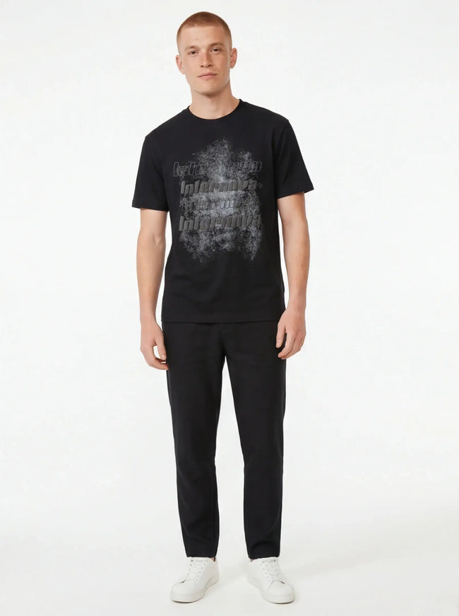 Crafted Clay Tee lifestyle image — the piece worn in context showing natural drape and proportions