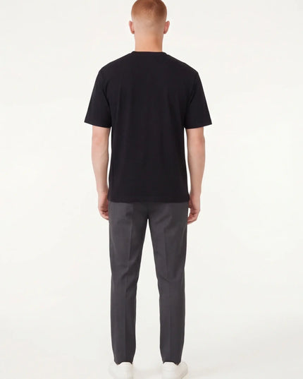 Maison Grozavu Timeless Sable Tee in signature tone — front view showing the tailored side seam