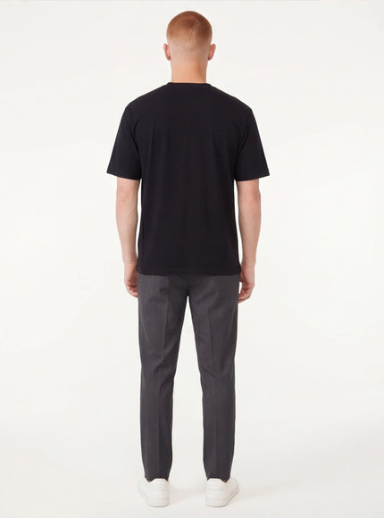 Model wearing Black bubble letter print short top by Grozavu