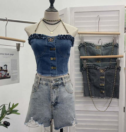Denim Buckle Strapless Slim Fit Tank Top displayed on a mannequin with denim shorts and stylish accessories.