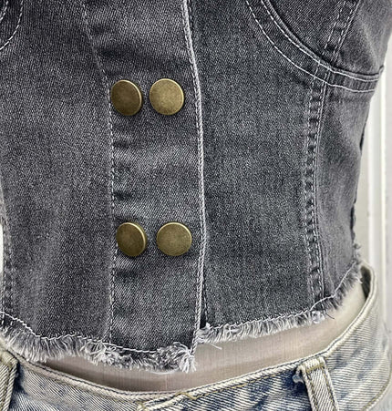 Denim Buckle Strapless Slim Fit Tank Top showcasing stylish buckle detailing and structured denim fabric.