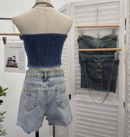 Denim Buckle Strapless Slim Fit Tank Top displayed on a mannequin with matching denim shorts in a stylish fashion setting.