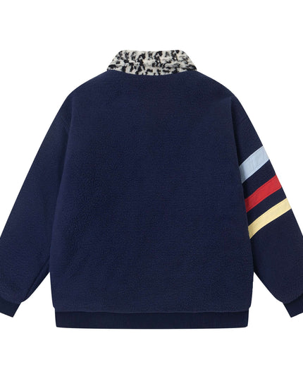 Rear view of the Maison Grozavu Classic Carbon Top in top — showing the tailored hem.