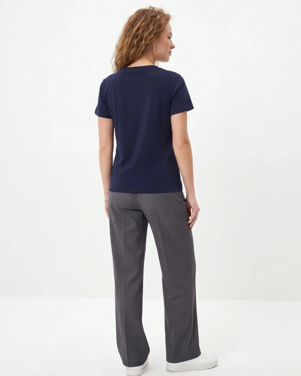 Maison Grozavu Minimalist Tee - Basalt Volume — rear view showing the back panel construction and Navy colourway hemline detail