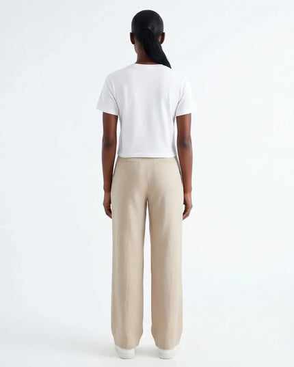 Maison Grozavu Stark Taupe Tee — rear view showing the back panel construction and neutral colourway hemline detail