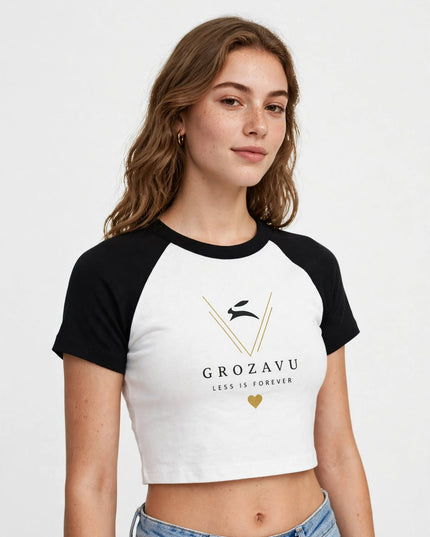 Low-angle editorial shot of the micro rib raglan baby tee, black sleeves