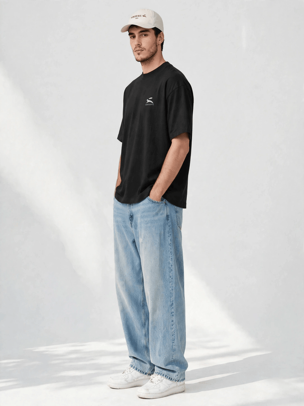 Editorial portrait wearing the low-profile cotton cap with curved peak