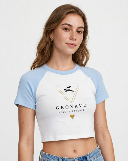 Waist-up editorial shot of the baby blue micro rib raglan tee