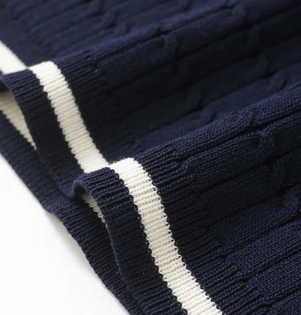 Eight-Strand Braided Knit Top – Loose Fit in navy blue with textured pattern and cream stripes.