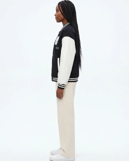 Front view of the Maison Grozavu Earth Top Drape in top — showing the structural collar.