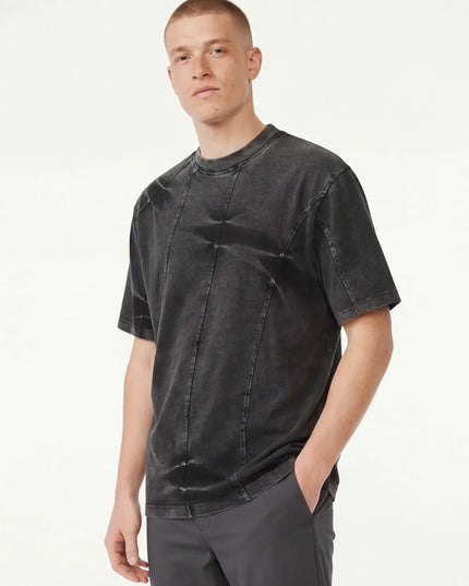 Maison Grozavu Slate Top Loom in black — front view showing the seamless shoulder transition