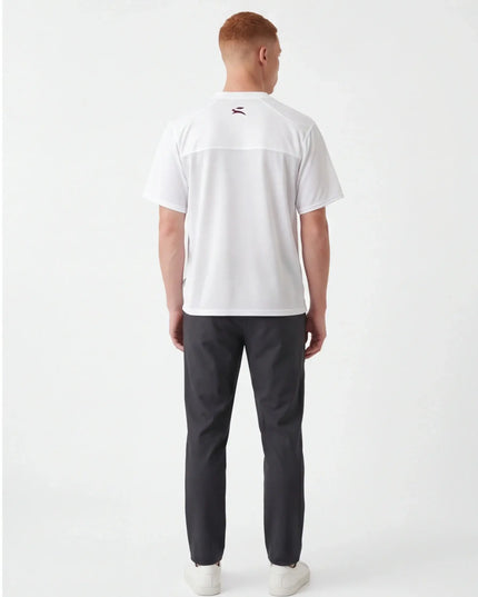 Rear view of the Maison Grozavu Dune Tee Volume in weave — showing the effortless drape.