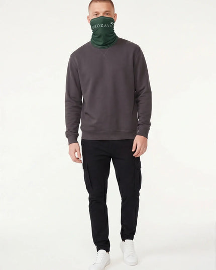 Lifestyle shot of the Maison Grozavu Lightweight Sand Neck Gaiter in gaiter — showing the robust construction.