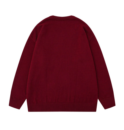 Back view of the Embroidered Cable Knit VNeck Sweater in deep burgundy color.