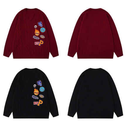 Embroidered Cable Knit VNeck Sweater in burgundy and black with heavy embroidery and textured cable-knit pattern.