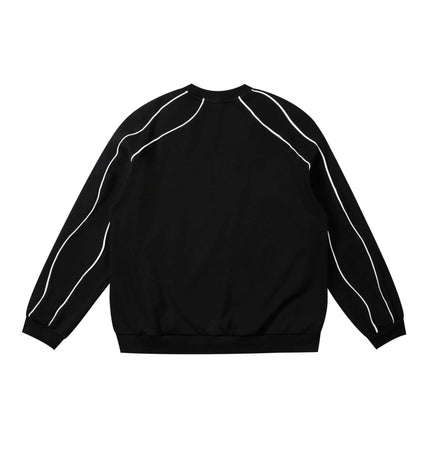 Back view of Embroidered Distressed Sweatshirt showcasing its loose fit and unique stitching details.