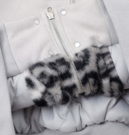 Inside view of the Grozavu Embroidered Hooded Coat – Loose Fit showcasing the cozy fur lining and zip-up closure.