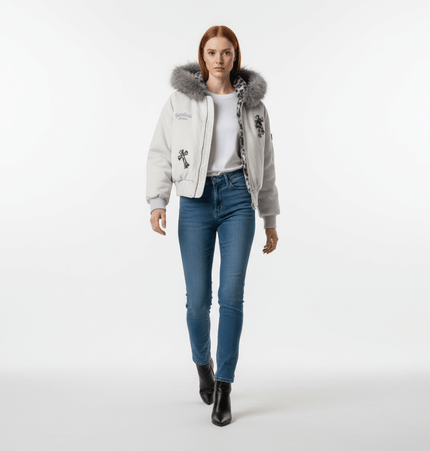 Embroidered Hooded Coat – Loose Fit worn by a model, featuring a cozy fur collar and relaxed silhouette.