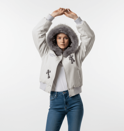 Embroidered Hooded Coat – Loose Fit model wearing white coat with fur collar and embroidery details.